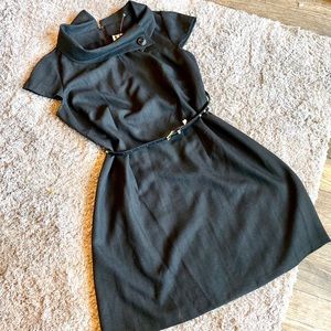 Sophisticated black cuffed neck dress